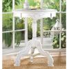Romantic Three-Legged Carved Pedestal Table