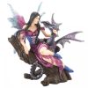 Fairy on Log with Dragon Figurine